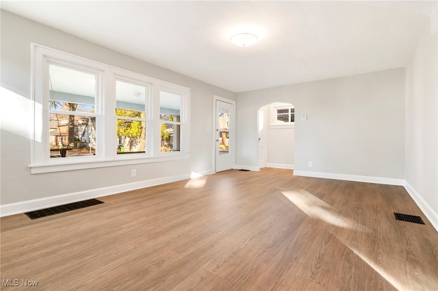 empty room featuring wood-type flooring