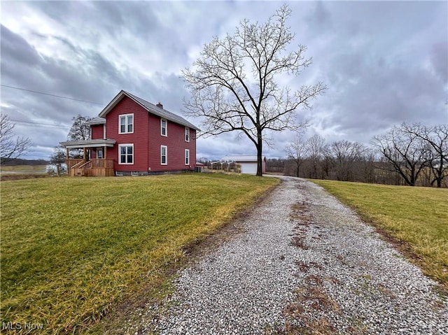 view of home's exterior featuring a yard