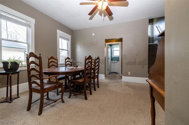 dining area featuring ceiling fan