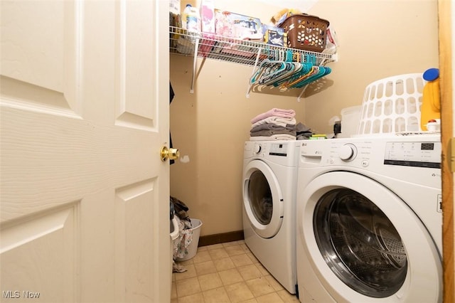 laundry area featuring washer and clothes dryer