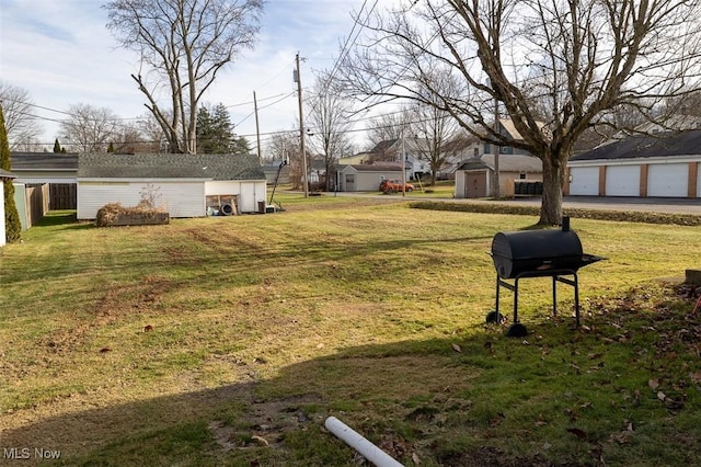 view of yard with an outbuilding