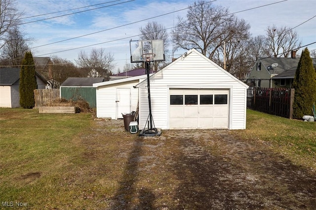 garage with a yard