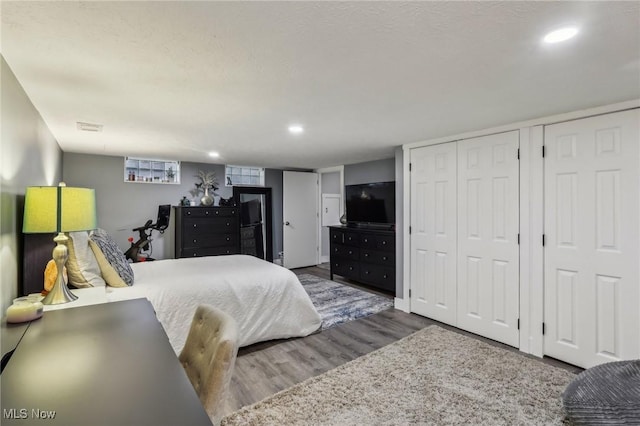 bedroom featuring dark hardwood / wood-style floors