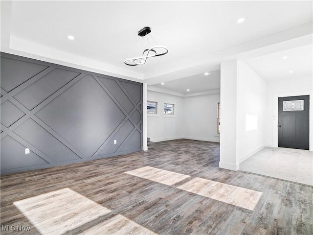 unfurnished living room with light hardwood / wood-style floors