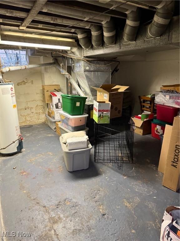 storage area featuring gas water heater