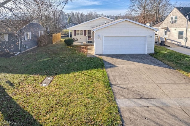 single story home featuring a front yard, a garage, and central AC unit