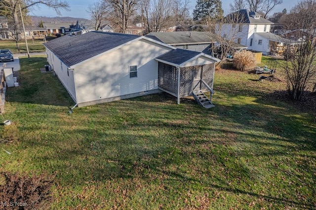 exterior space with a lawn