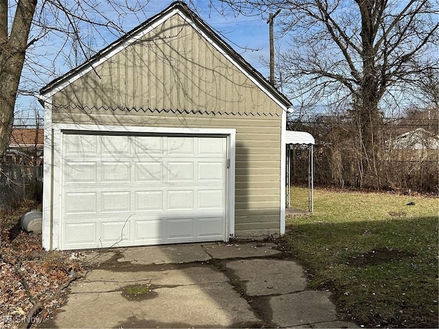 garage featuring a yard