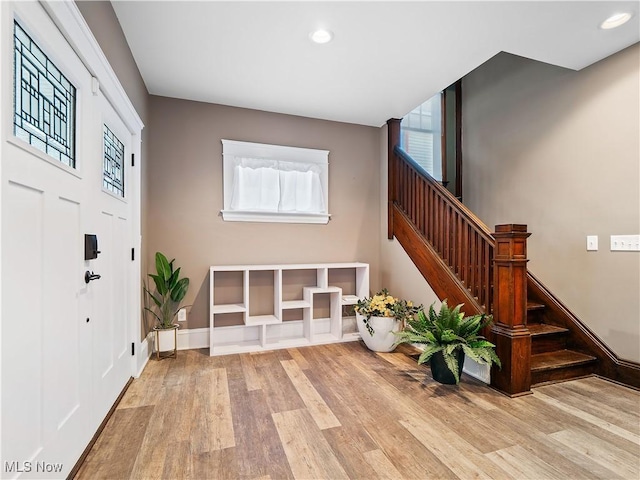 entrance foyer with light wood-type flooring