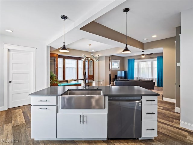 kitchen with dishwasher, dark hardwood / wood-style floors, white cabinetry, and decorative light fixtures