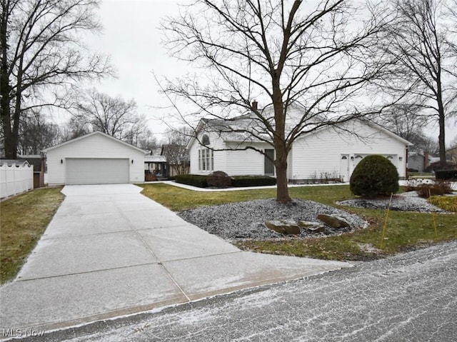 exterior space featuring a garage and a yard