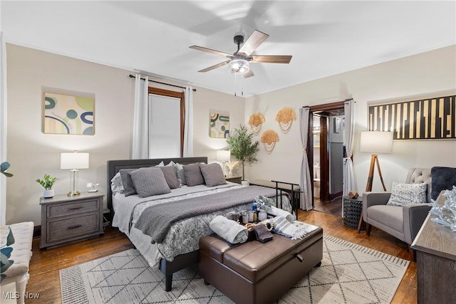 bedroom featuring ceiling fan and light hardwood / wood-style flooring