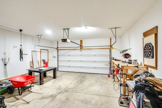 garage featuring a garage door opener