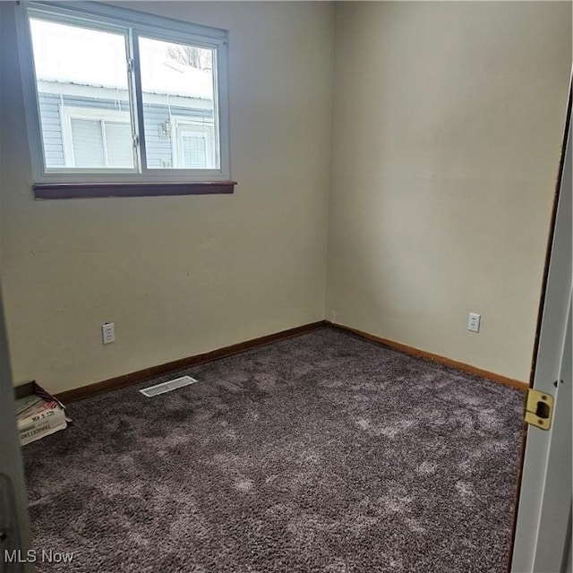 view of carpeted spare room