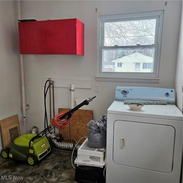 washroom with washer / dryer