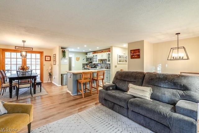 living room featuring light wood-type flooring