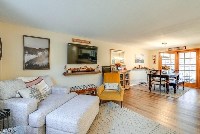 living room with light hardwood / wood-style floors