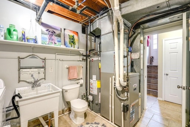 utility room with water heater