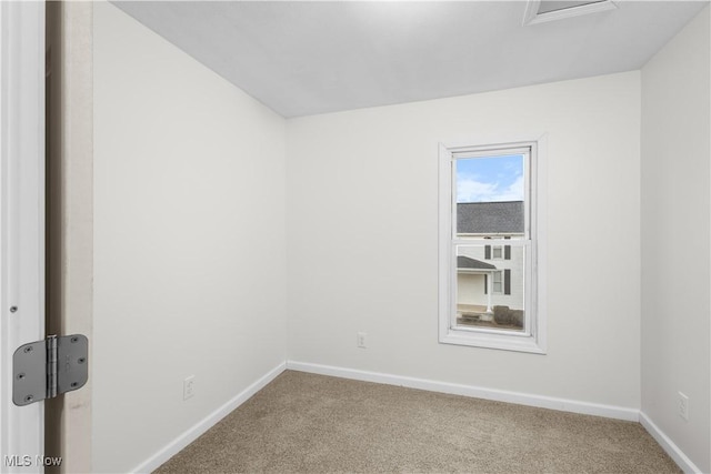 view of carpeted spare room