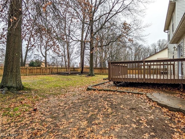 view of yard with a wooden deck