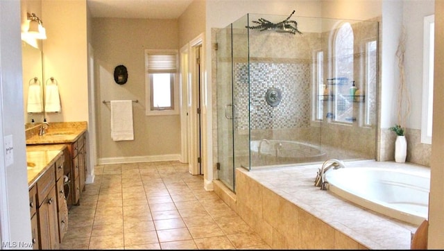 bathroom featuring vanity, tile patterned floors, and independent shower and bath