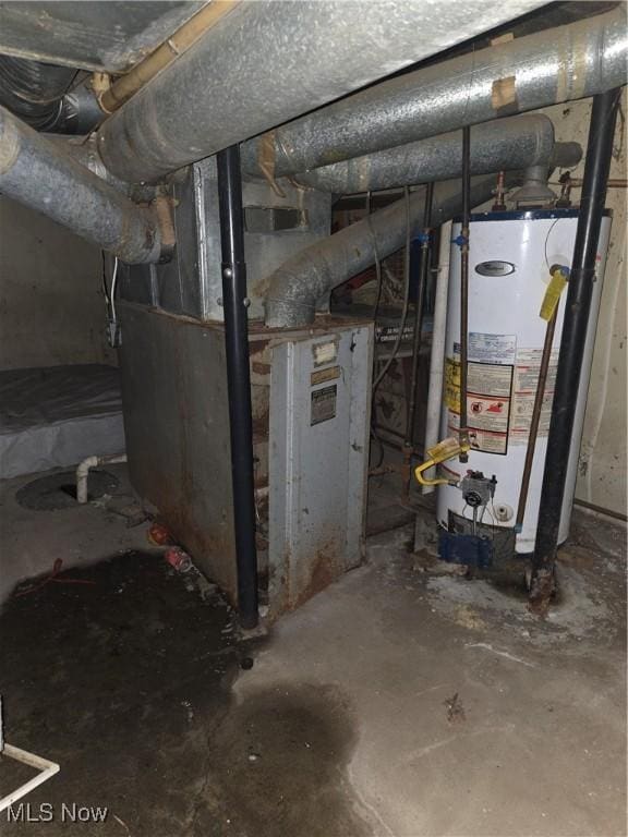 utility room with water heater