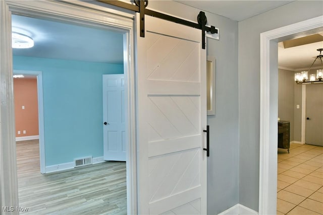 bathroom featuring a notable chandelier