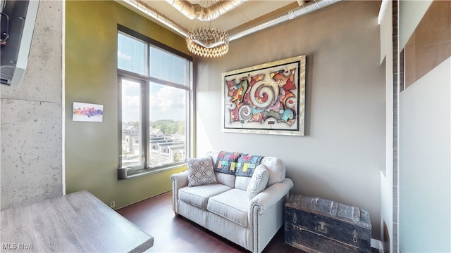 21 Furnace St Unit 705, Akron, OH 44308 - sitting room with healthy amount of natural light, wood finished floors, and a chandelier