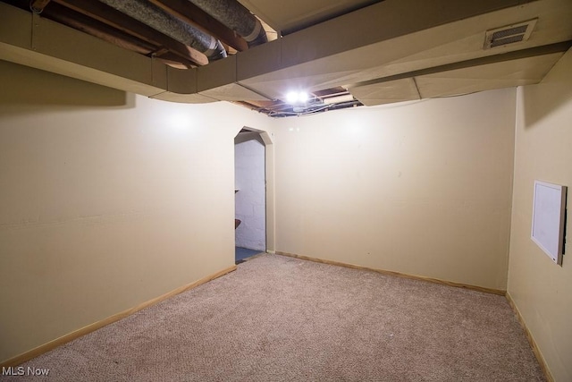 basement with carpet floors