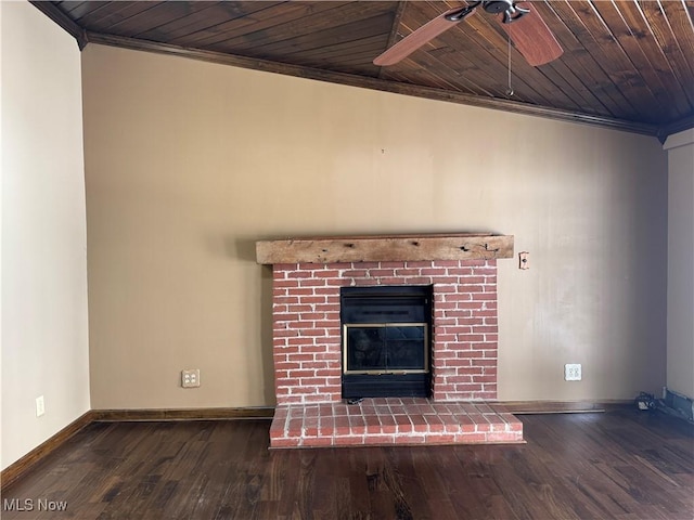 unfurnished living room with crown molding, a brick fireplace, wooden ceiling, dark hardwood / wood-style floors, and ceiling fan