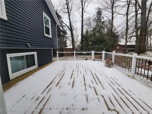 view of snow covered deck