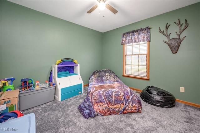 playroom with carpet flooring and ceiling fan