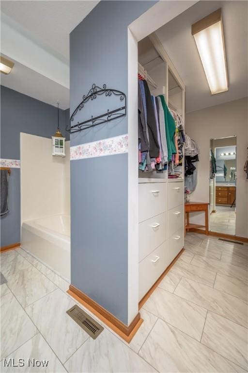 bathroom featuring a bathing tub