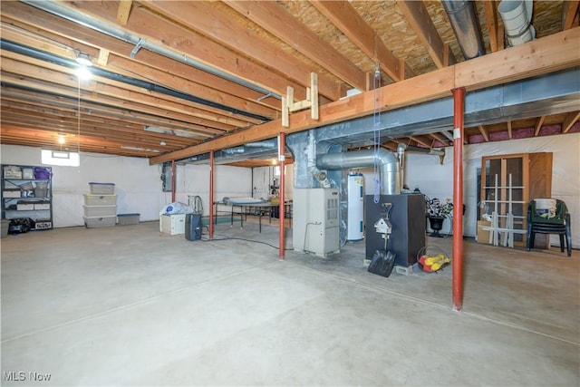 basement with heating unit and water heater