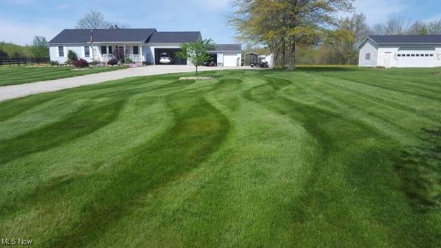 view of yard with a garage