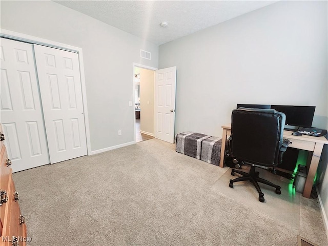 home office with light carpet