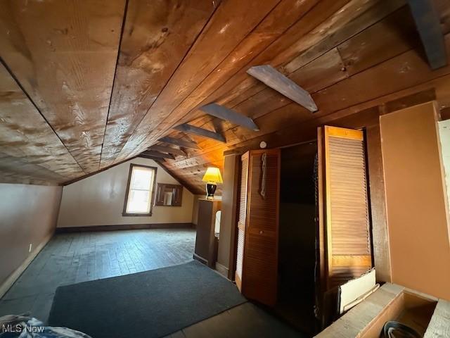 60 Liberty St, Seville, OH 44273 - bonus room with vaulted ceiling, wood ceiling, baseboards, and wood-type flooring