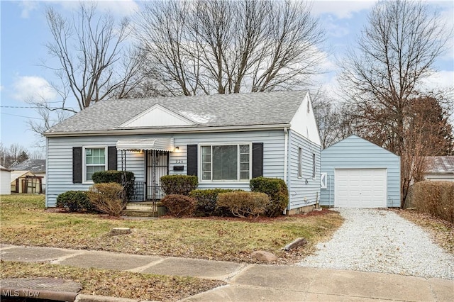 view of front of house featuring a garage and a front lawn