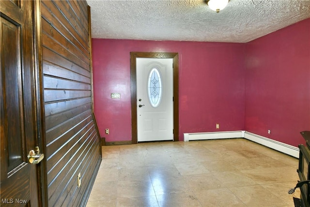 entryway with a baseboard radiator