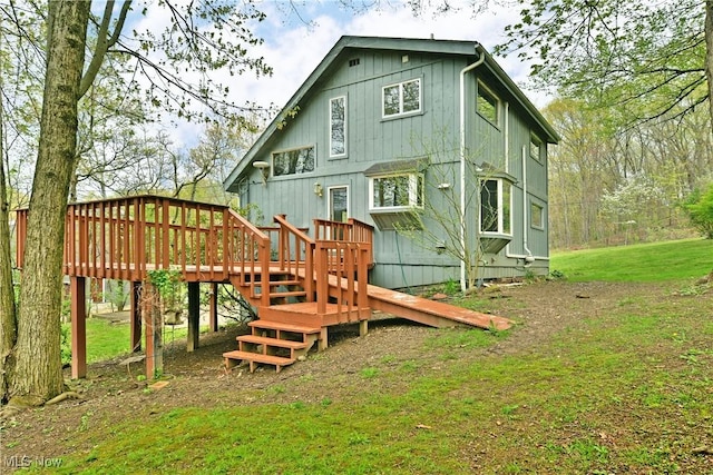 48077 Allegheny Trl, Negley, OH 44441 - rear view of house with a lawn and a deck