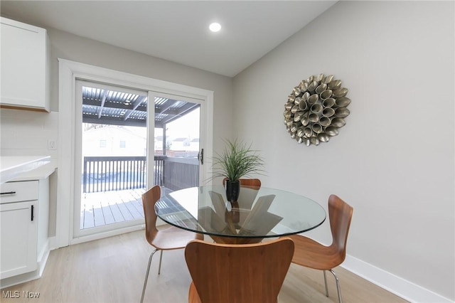 dining area featuring light hardwood / wood-style flooring