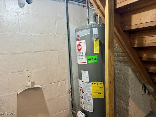 utility room with water heater