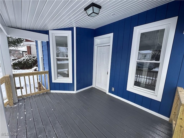 view of snow covered deck