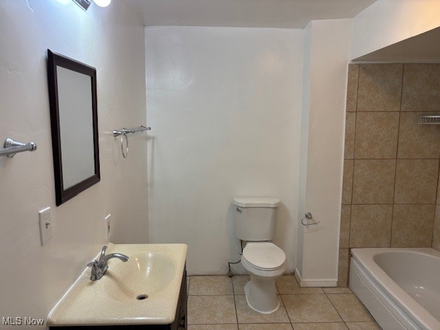 full bathroom with tile patterned floors, vanity, separate shower and tub, and toilet