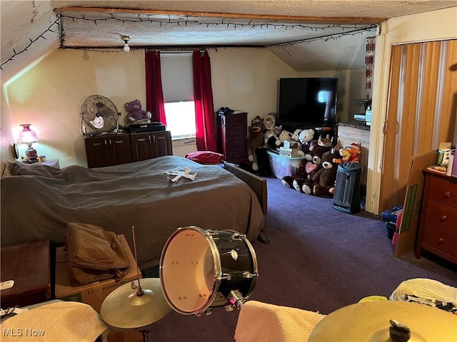 bedroom featuring carpet floors, a textured ceiling, and vaulted ceiling