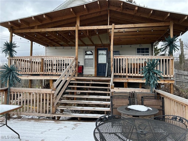 view of snow covered deck