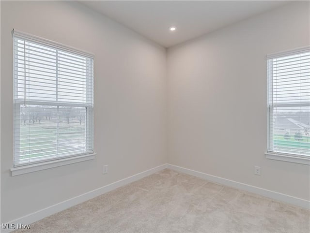 view of carpeted spare room