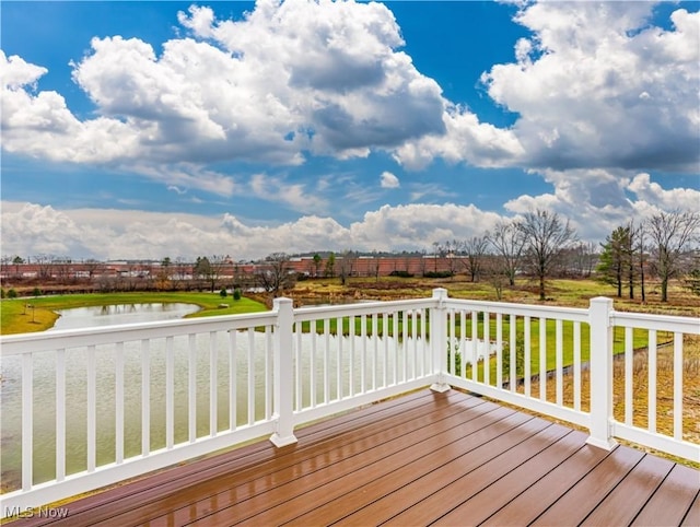 wooden terrace with a water view