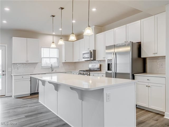 kitchen featuring white cabinets and stainless steel appliances