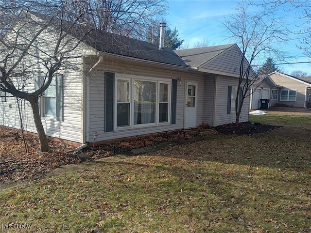 exterior space with a lawn